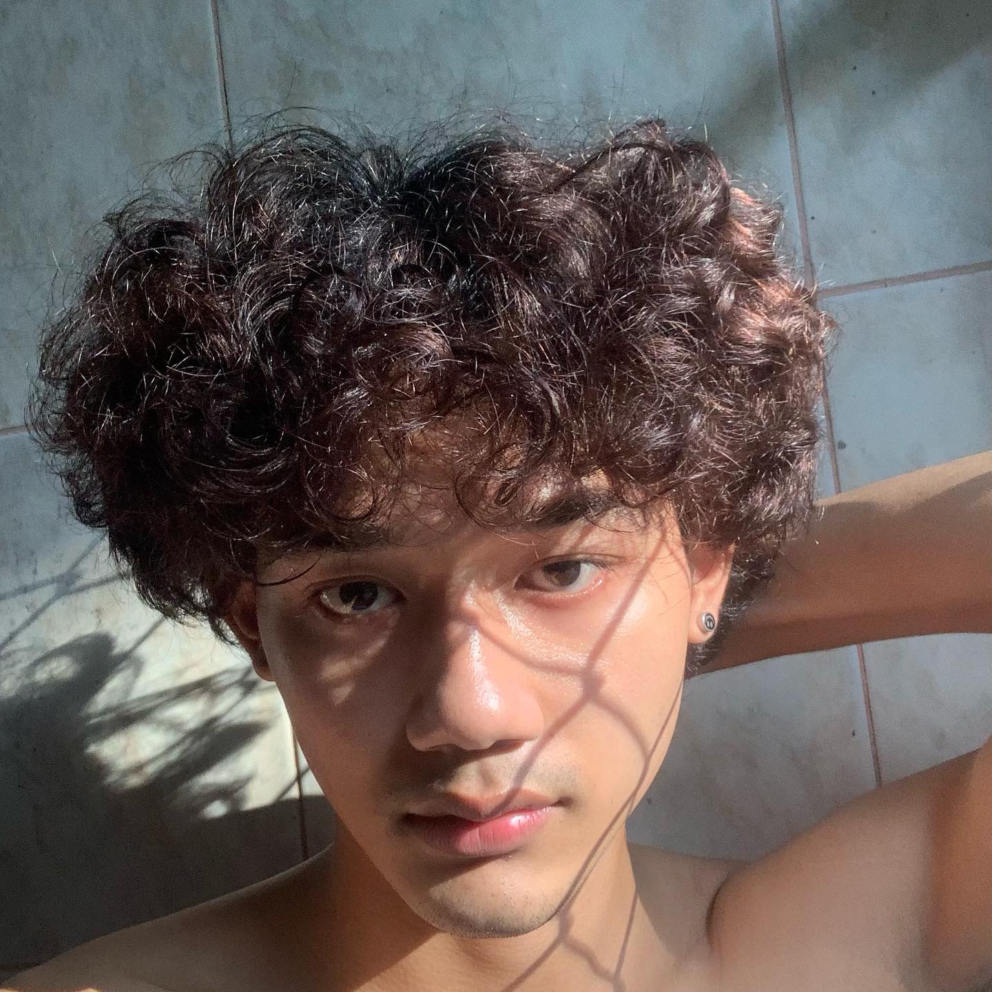 ซัน ร้อยพินิจ