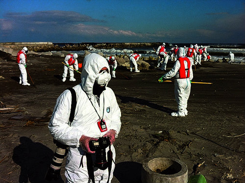 Photographer Jeremy Sutton-Hibbert photographing in the 20km nuclear exclusion zone around Fukushima Daiichi nuclear plant, in, Japan, on Monday 27 February 2012. .