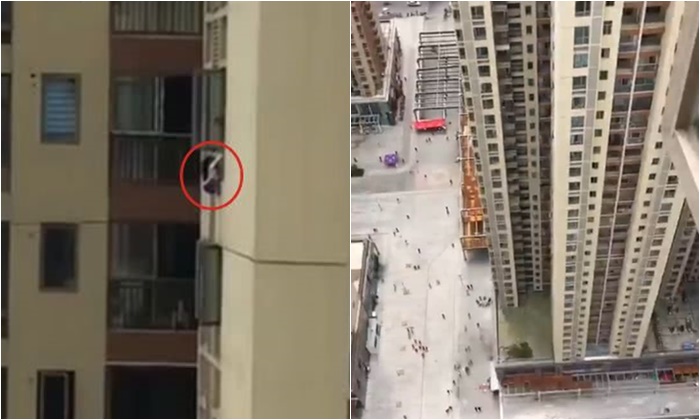 เด็กหญิงปีนเล่นนอกหน้าต่างตึกชั้น 43 ตัวห้อยกลางอากาศสุดหวาดเสียว (มีคลิป)