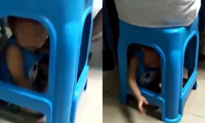 รุมจวกยับ แม่จีนจับลูกขังใต้เก้าอี้ นั่งทับเล่นไพ่นกกระจอกเฉย