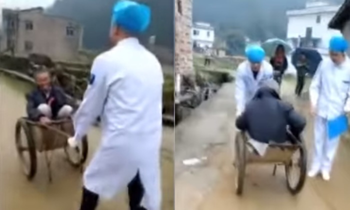 ทั้งซึ้งทั้งเขิน หมอชนบทจีนเข็นรถขนปูน พาคนไข้สูงอายุส่งโรงพยาบาล