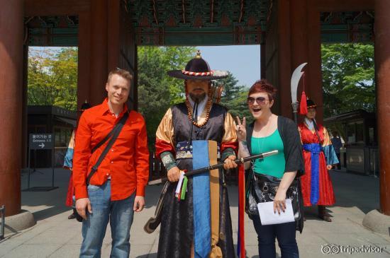 my husband and I hamming it up with a palace guard