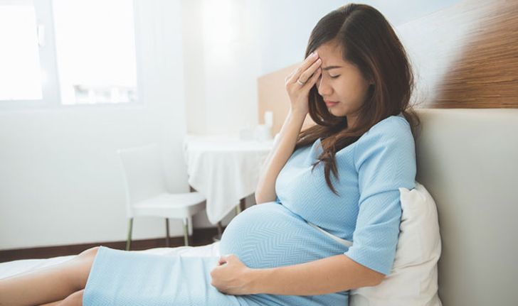 อาการปวดหัวช่วงตั้งครรภ์เกิดจากอะไร อันตรายไหม ทำยังไงให้ดีขึ้น?