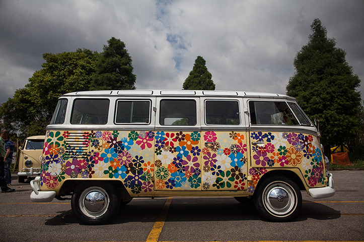 A Volkswagen Kombi minibus painted in flowers