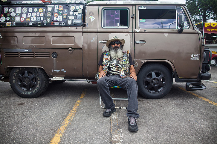 Marco Antonio in front of his Volkswagen Kombi