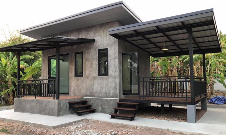 บ้านโมเดิร์นลอฟท์ขนาดเล็ก ปูนเปลือยทั้งหลัง พร้อมระเบียงยกพื้น เหมาะสำหรับทำเป็นรีสอร์ท
