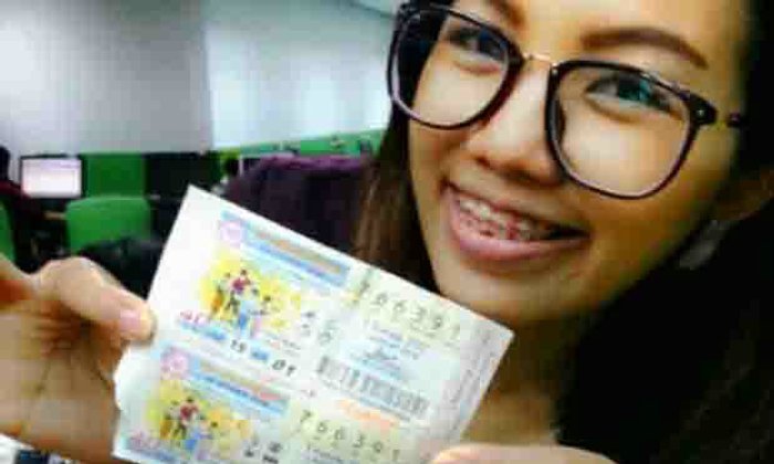 สุดเฮง !สาวออฟฟิศโชว์ผ่านFBถูกรางวัลที่1