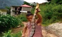 ชายจีนจับงูจงอางฆ่าถลกหนังทำอาหาร ตร.พบคลิปเข้ารวบตัว