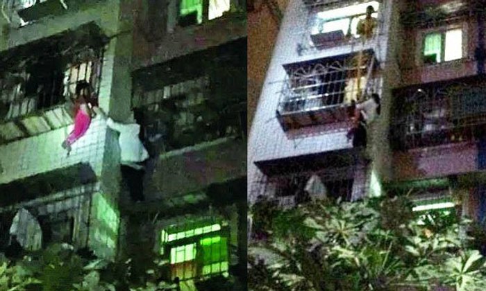 สาวจีนฮีโร่! ปีนตึก 5 ชั้นมือเปล่า ช่วยเด็ก 3 ขวบพลัดตกหน้าต่าง