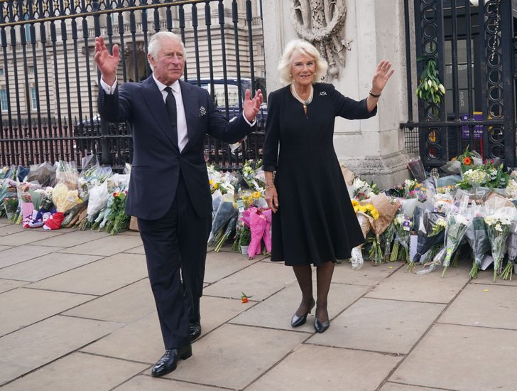 King Charles III and Queen Camilla  of the United Kingdom  A public tribute to Her Majesty Queen Elizabeth II outside Buckingham Palace, London, Sept. 9, 2022.