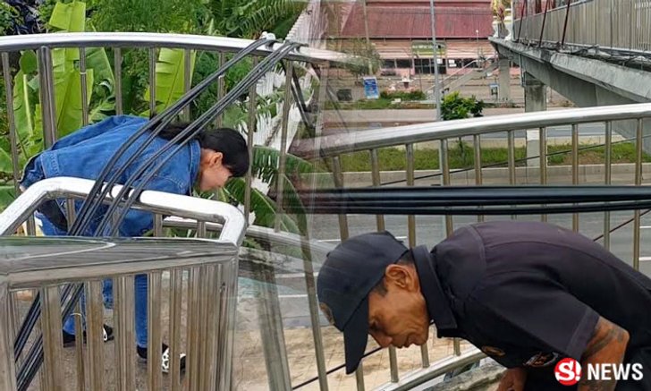 ชาวบ้านโวย! สายไฟผ่ากลางสะพานลอย ใช้เทคนิคขั้นสูงเดินข้าม