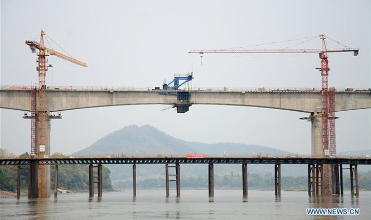 เชื่อมต่อสำเร็จ สะพานทางรถไฟจีน-ลาว ข้ามแม่น้ำโขงแห่งแรก