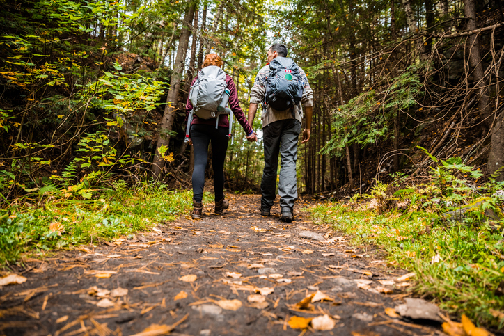 couple-holding-hands-walking-