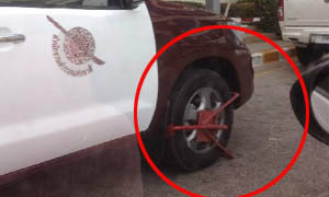 ชาวเน็ตชื่นชมรปภ.ใจเด็ด ล็อกล้อรถตำรวจฐานจอดผิดที่