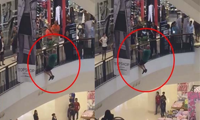 เสียวกลางห้าง ฝรั่งปีนระเบียงทำท่าจะโดด ผู้คนเห็น-กรีดร้อง