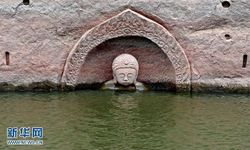 ฮือฮา! จีนพบเศียรพระพุทธรูปโบราณโผล่ในอ่างเก็บน้ำ หลังน้ำลด