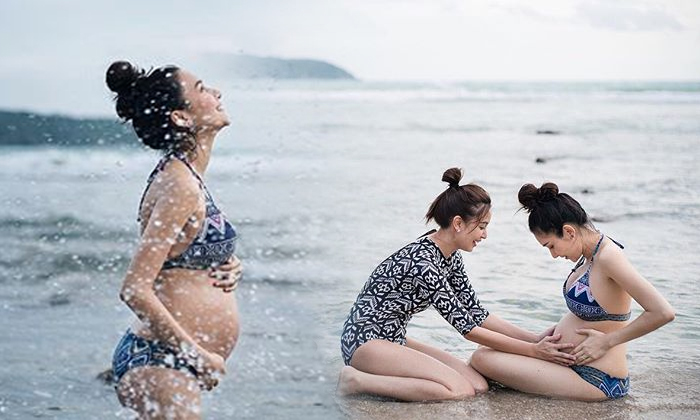 เนย โชติกา คุณแม่แฮปปี้ ใส่บิกินีอวดท้องโตเล่นน้ำทะเล