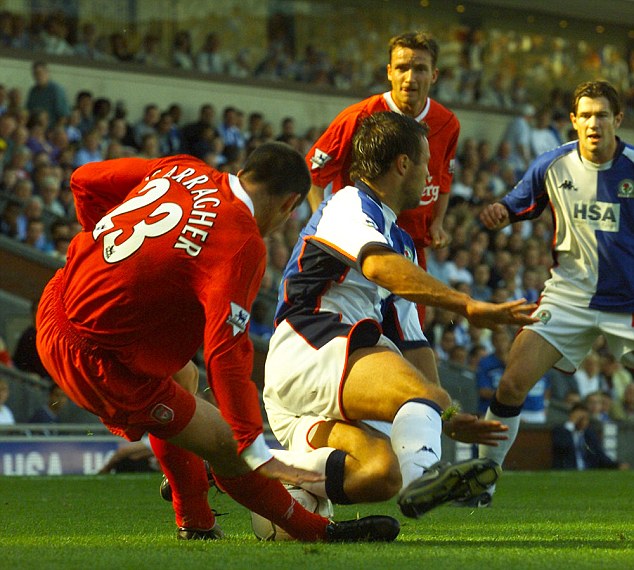 Leg break: Carragher was out for six months after breaking his leg against Blackburn following a tackle by Lucas Neill 