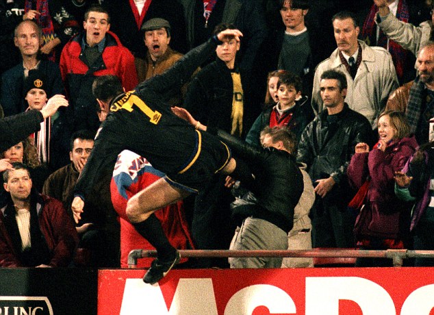Kung-fu fighting: Eric Cantona jumps into the crowd and kicks Crystal Palace fan Matthew Simmons 
