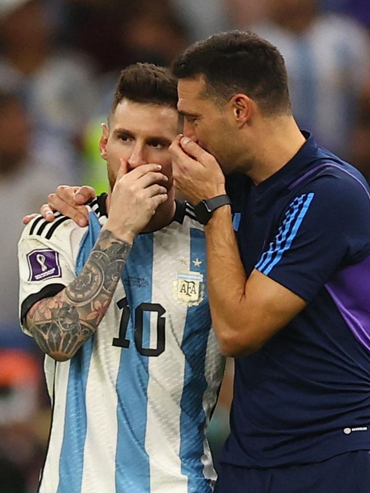 messi_scaloni_reuters-three_f