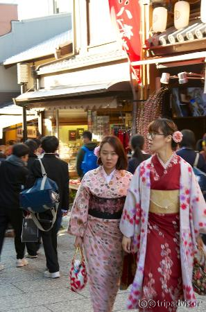 See ladies clad in kimono working around