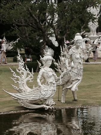 Lovely apsaras floating above the water