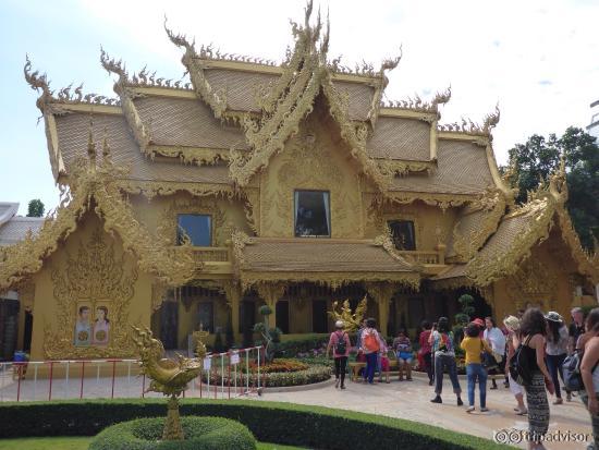 Right beside the white temple is this golden house.