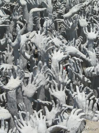 Check out the detail of the single red fingernail. Apparently glows at night