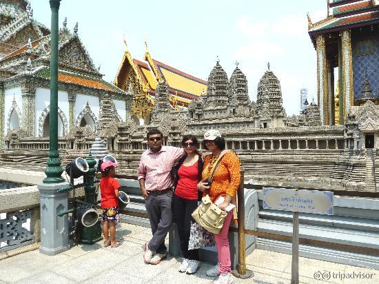 At the backdrop of Angkar Wat temple miniature model