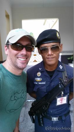With one of the security guard