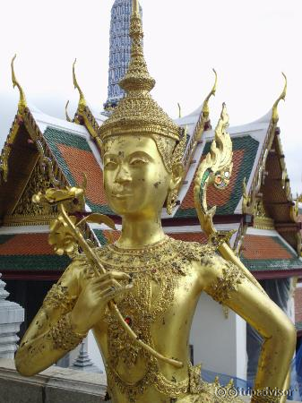 Sculpture of tailed god