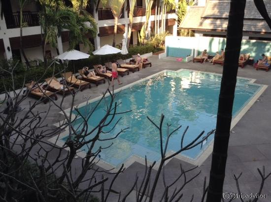 The pool area located in the centre of all the rooms at Rimping Village Hotel.