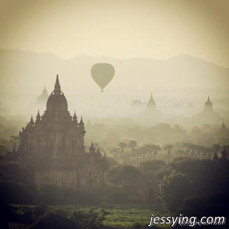Amazing sunrise view with hot ballon flying over Bagan at Shwe-san-daw Pagoda