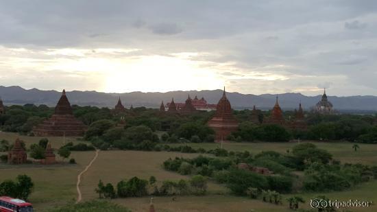 Pagoda with tour buses in frame