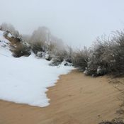 Snow and sand by the hotel grounds