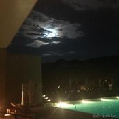 Poolside dining and a full moon