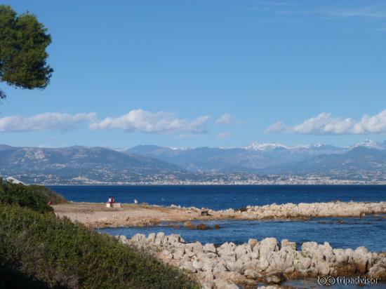 "Chemin du littoral Cap d 'Antibes" and view of the French Alps