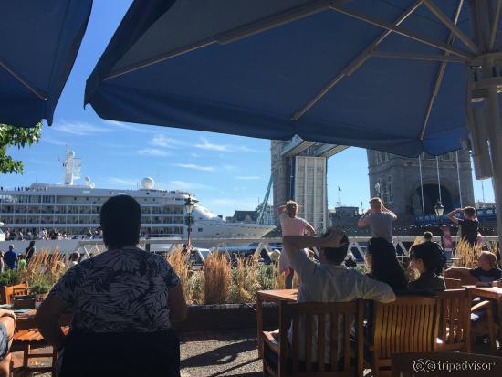 Drinks on The Lawn watching the Tower Bridge rise.