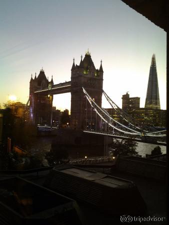 Tower Bridge with London in the darkening background