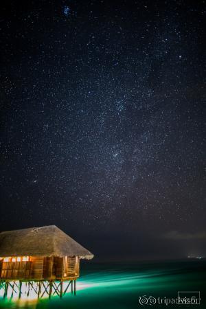 Night shot from the Retreat water villa on the east side of the east island.