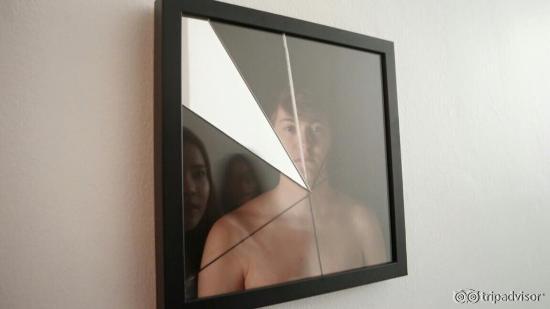 This picture is a mirror shadow reflect, when you look at the mirror you will feel like your fac