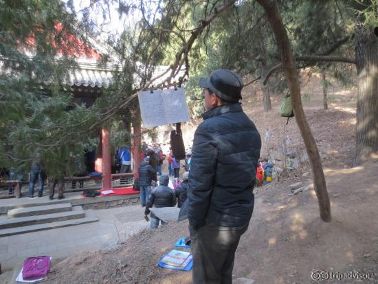 People singing and playing instruments on the hill