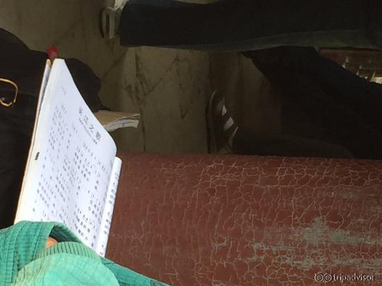 song book during sing-a-long of nationalistic songs
