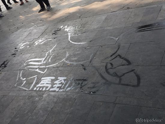 temporary water art by a local man