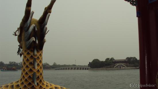 A View Of The Arch Bridge and The Pavilion from The Dragon Boat. Beijing China.