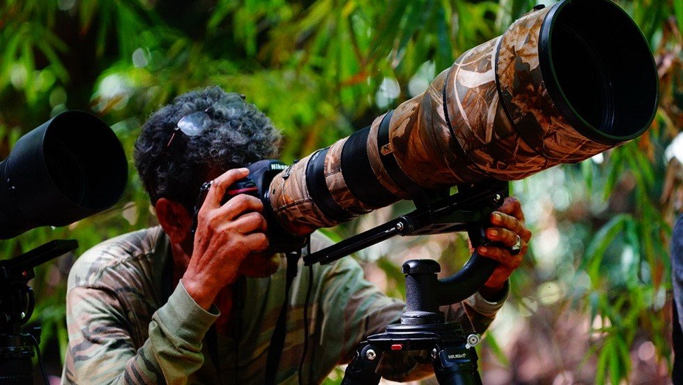 บ้านขามสายน้ำมีชีวิต ส่องนกกินปลีคอแดง ดอกไม้ป่าสีสันสวยงาม