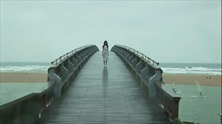 Rina Akiyama  crosses the bridge