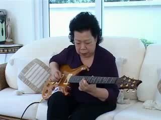 Grandma Rawks_ Guitar ownage  by  sia.co.th