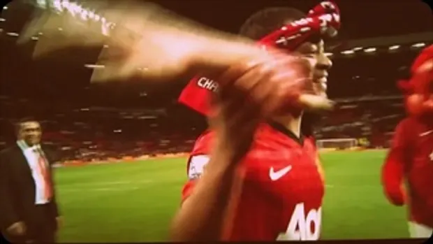 Patrice Evra taking a dig at Luis Suarez- Biting inflatible hand