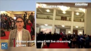 ล้ำมาก นักข่าวจีนใช้ “แว่นตาเทคโนโลยี AR” ถ่ายทอดสดการประชุมสองสภา